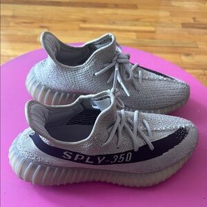 Yeezy Gray and Black Sneakers with Boost Cushioning